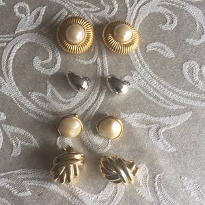 Set of four clip-on earrings.